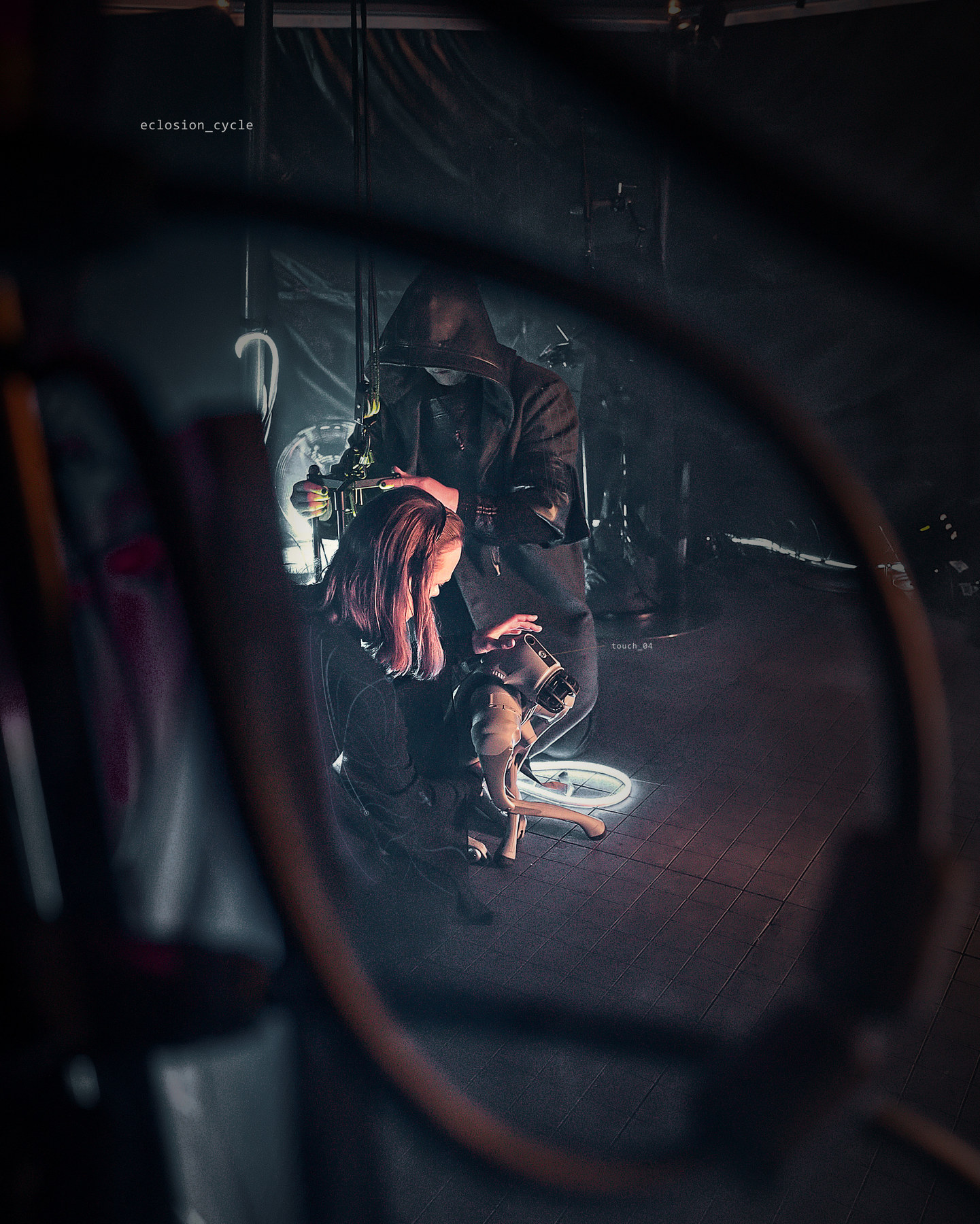 A performer reaches towards Oxi while another performer stands nearby, seen through the edge of the performance space. Fine lines trace their presence.